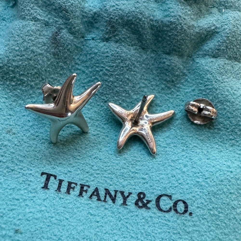 Authentic Tiffany and Co. sterling silver starfish earrings.